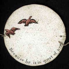 One side of a thaumatrope showing birds