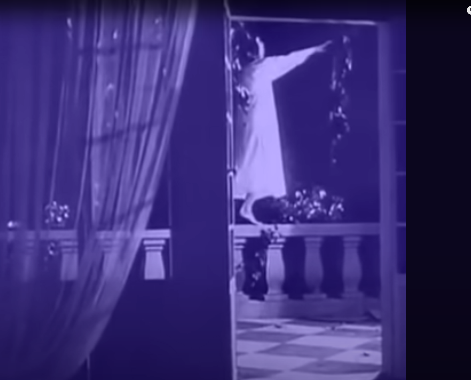 Ellen walking on the railing