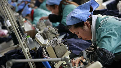 Women work sewing machines at a Chinese factory