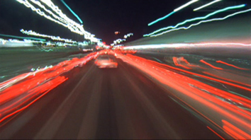 image of headlights from the film koyaanisqats